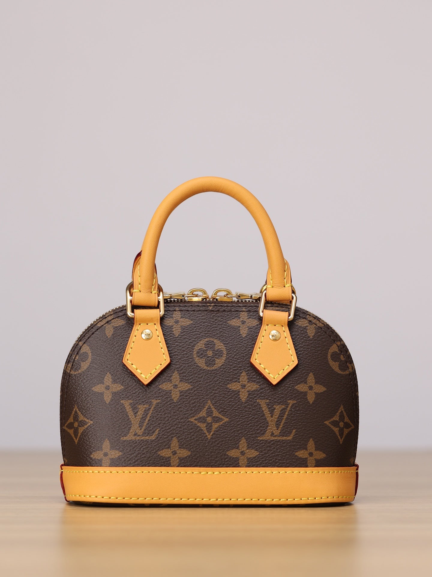 LV NANO ALMA Handbag