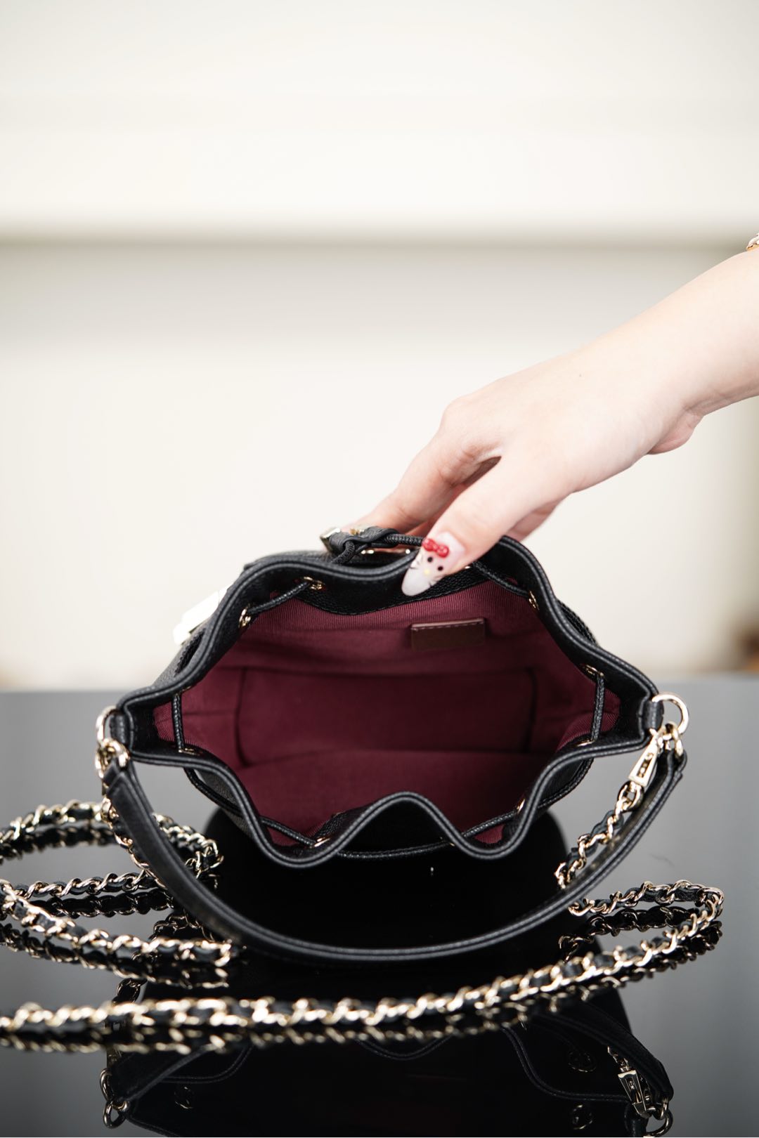 Chanel 25B Chain drawstring mini bucket bag