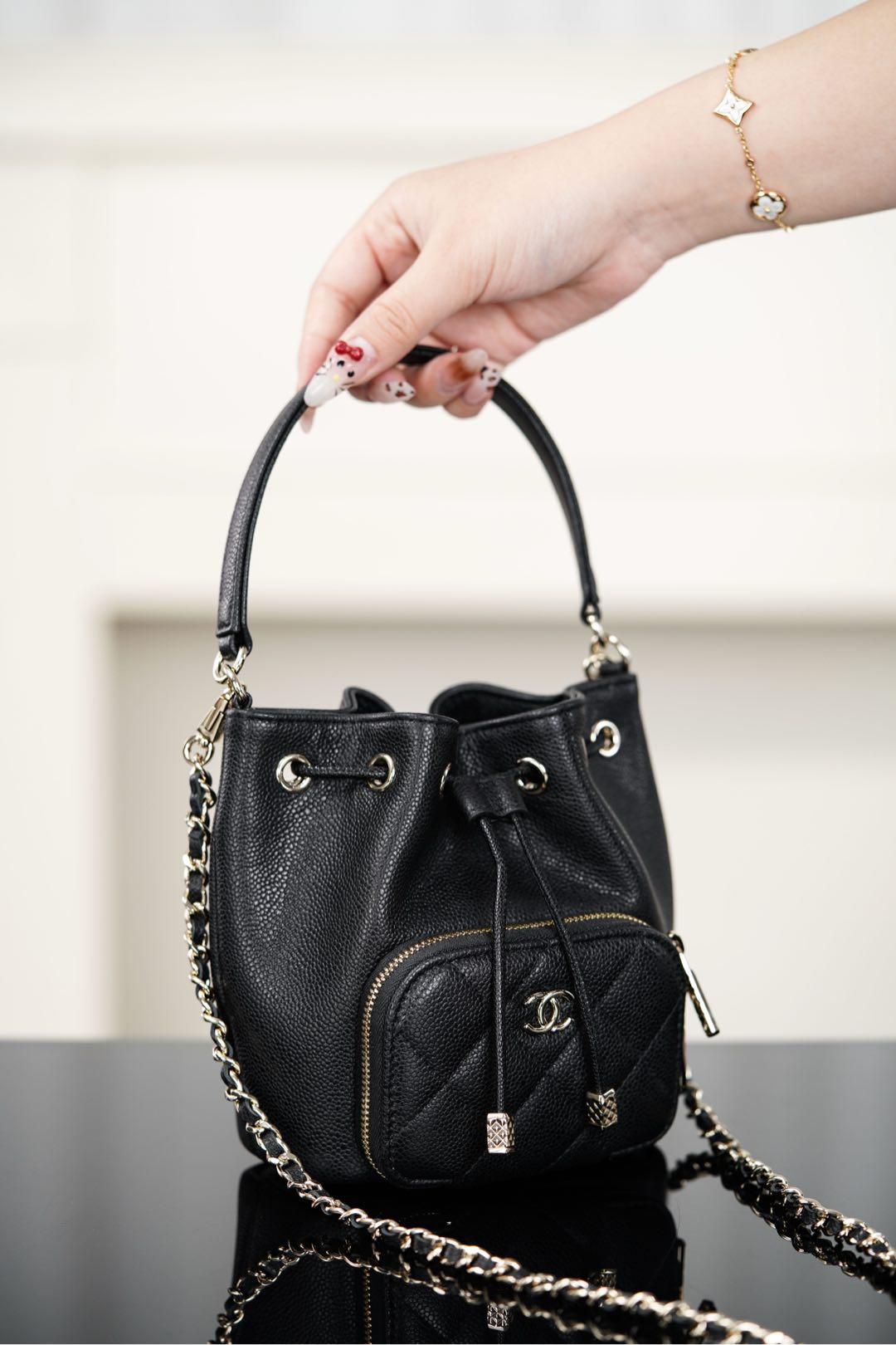 Chanel 25B Chain drawstring mini bucket bag