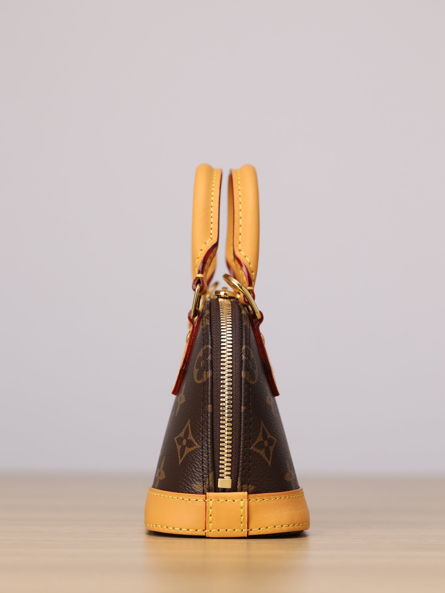 LV NANO ALMA Handbag