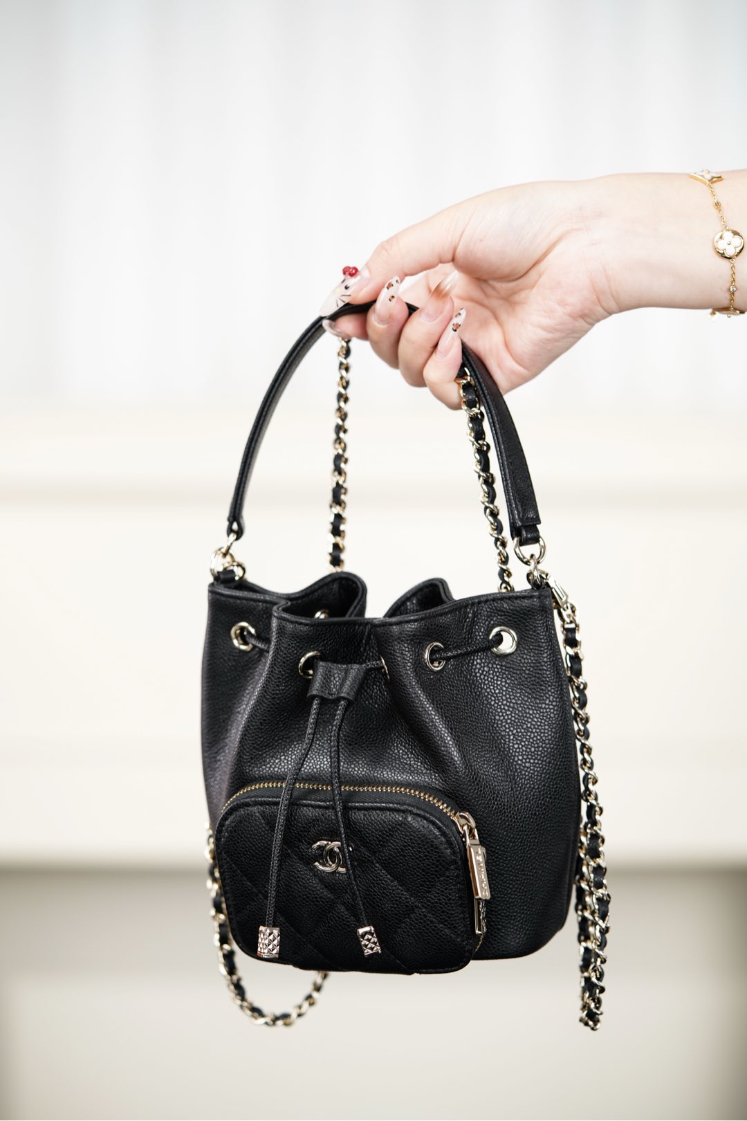 Chanel 25B Chain drawstring mini bucket bag